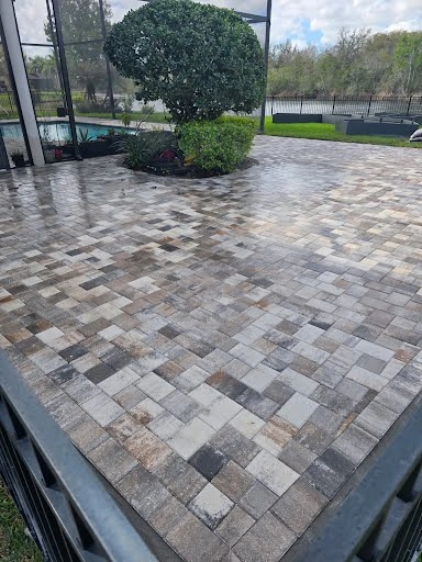 Paver patio installation in a Tampa backyard